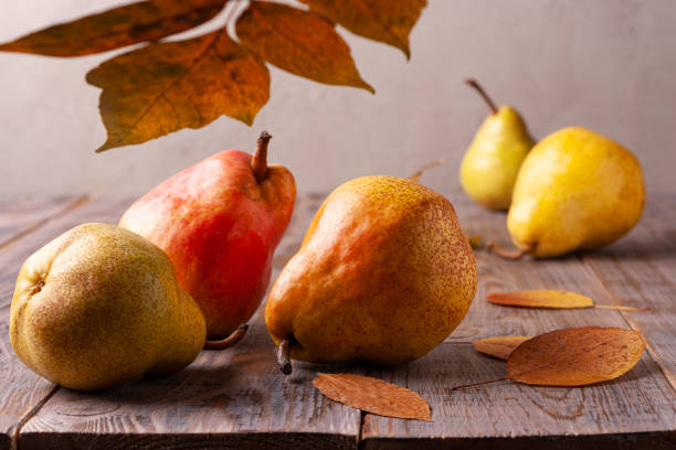 istock Pears on a wooden table. Close-up. 1316038631