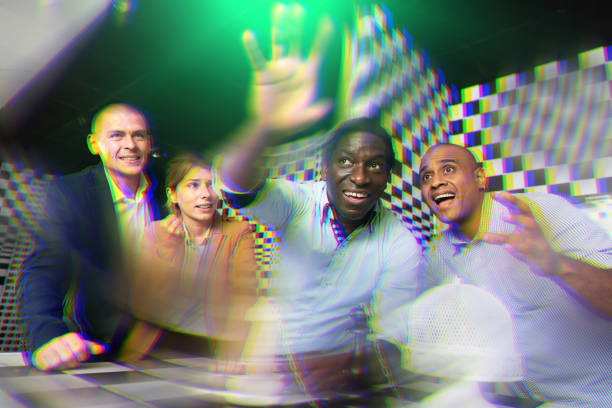 istock Four friends solving puzzles in quest room 1316041774