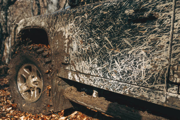 istock Dirty off road car on trip in forest 1316042880