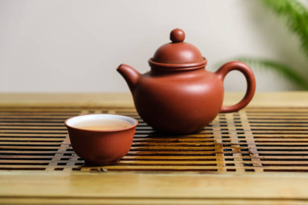 istock A teapot for brewing Chinese tea and a tea bowl. 1316044272