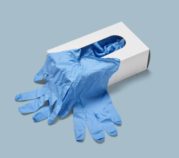latex glove protective protection virus corona coronavirus epidemic disease medical health hygiene close up of a box of white latex protective gloves on white background plastic gloves stock pictures, royalty-free photos & images