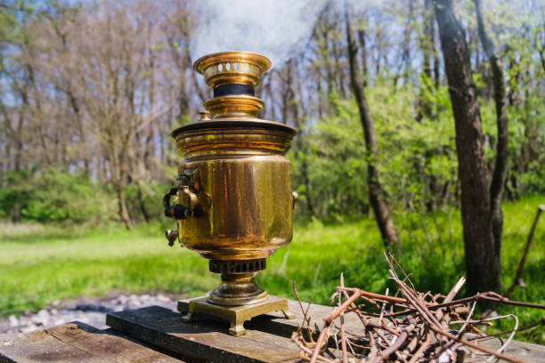 istock Antique wood-burning samovar with smoke 1316044392