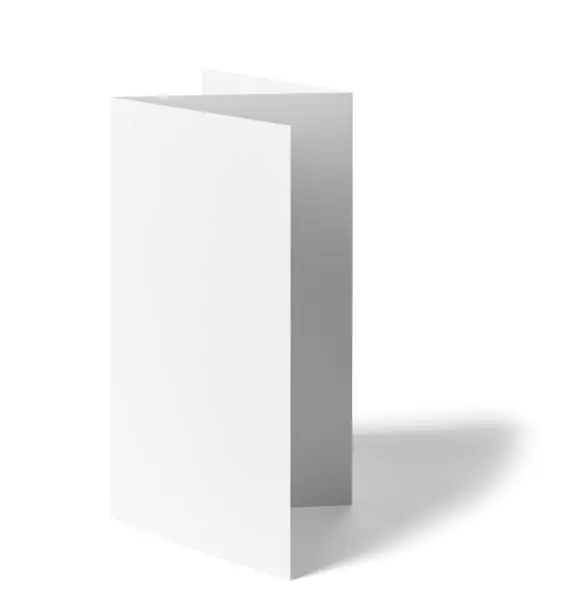 close up of a  blank folded leaflet white paper on white background