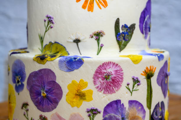 istock Colourful wedding cake with flowers 1316049934