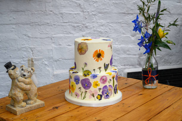 istock Colourful wedding cake with flowers 1316050070