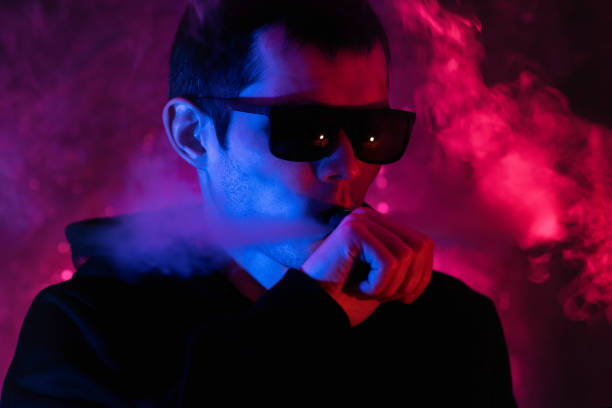 istock vape man neon stylish portrait 1316051471