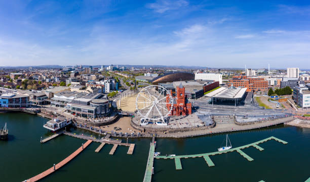 Panoramic aerial view of Cardiff Bay with the city centre in the background Panoramic aerial view of Cardiff Bay on a sunny day with the city centre in the background. cardiff wales stock pictures, royalty-free photos & images