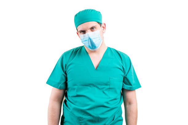 istock Tired doctor in a cap and a mask. 1316056410