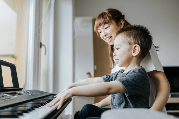 istock Japanese mother teaching her son 1316056538