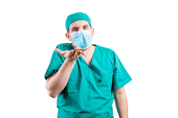 istock An indignant doctor in a cap and a mask. 1316056565