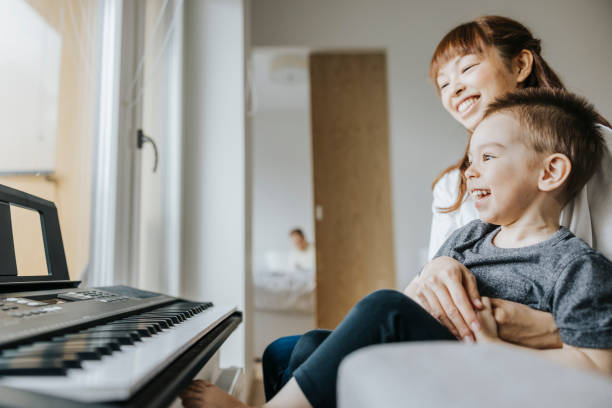 istock Japanese mother teaching her son 1316056567