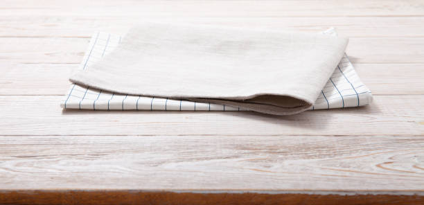 istock Napkin, table cloth on wooden deck mockup. 1316057466