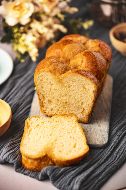 Homemade baked braided brioche bread stock photo