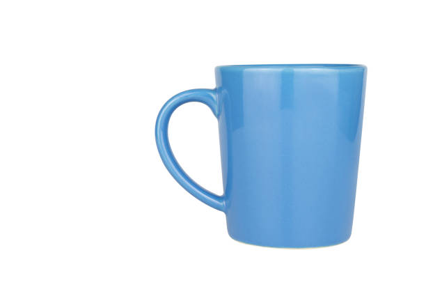 istock Blue ceramic mug cup with clipping path on white background for Mockup advertising concepts 1316058409