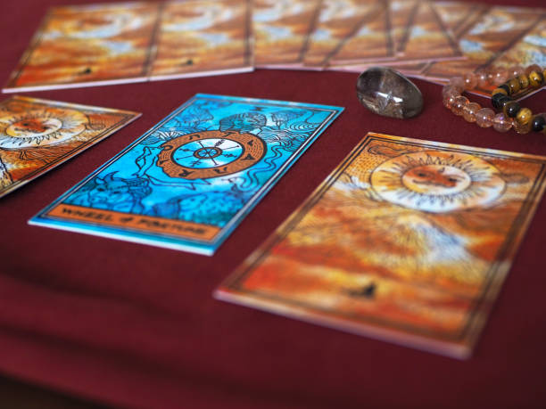 istock tarot card reading wheel of fortune teller astrologer divination selected focus 1316059162