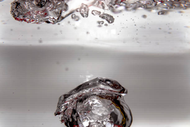 istock Air bubbles, abstract shapes were formed in the water. 1316059706