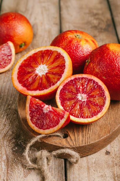 istock Blood oranges on a wooden tray. 1316061108