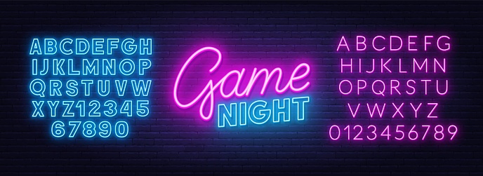 Game night neon sign on brick wall background. Neon blue and pink alphabet .