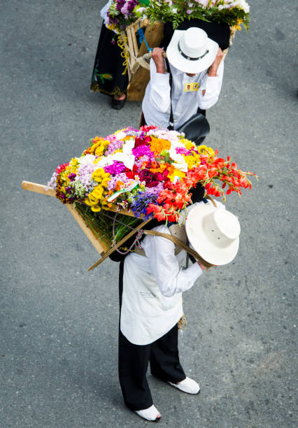 Medellin, Antioquia, Colombia. August 11, 2013: The Silleteros Parade is the central event of the Flower Fair in Medellín, Colombia, to which local residents and tourists flock each year.