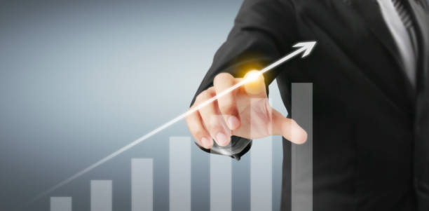 istock Hand touching  graphs of financial indicator and market analysis chart 1316066164