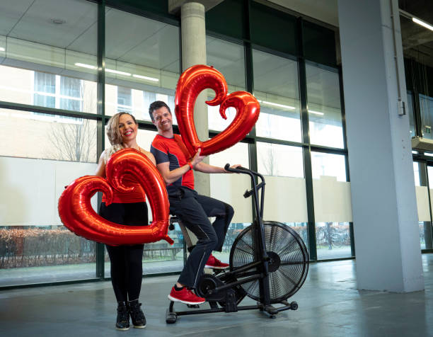 istock personal trainers in gym, valentine theme 1316069253