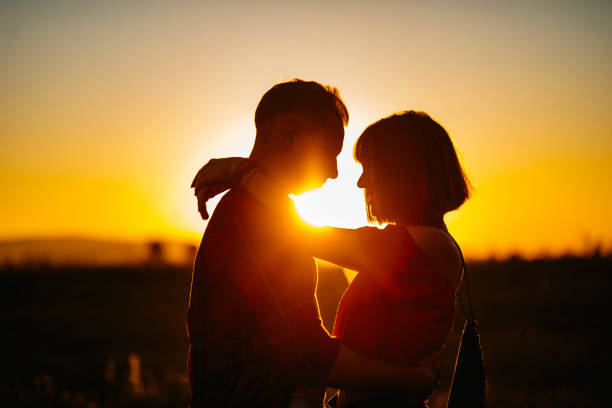 istock Romantic couple at sunset 1316070505