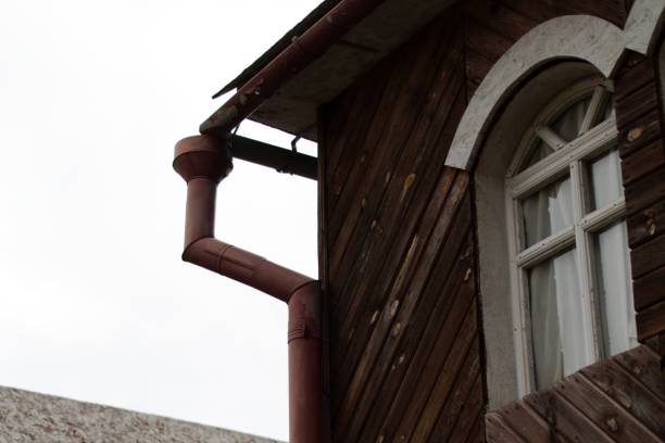 istock drain pipe and window of old house 1316072436