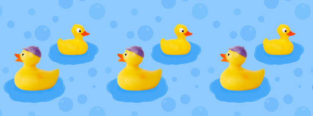 istock Pattern of yellow ducklings on a blue background. 1316073698