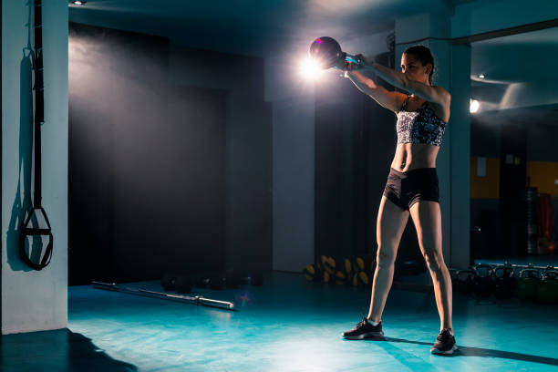 istock A fit young woman exercising with a kettlebell 1316074113