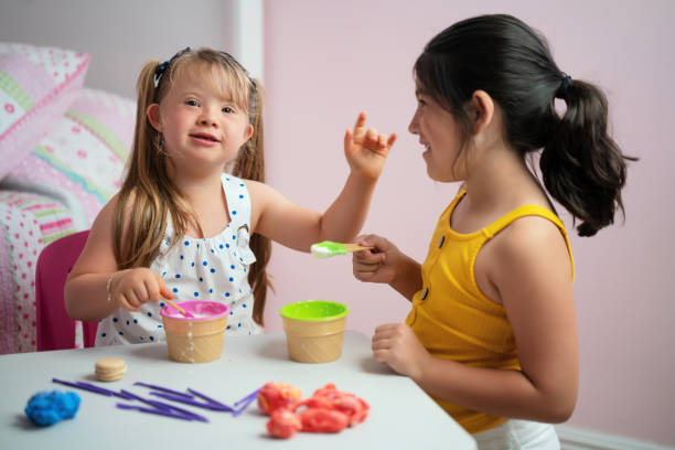 istock Great friends sharing ice cream in the bedroom 1316075347