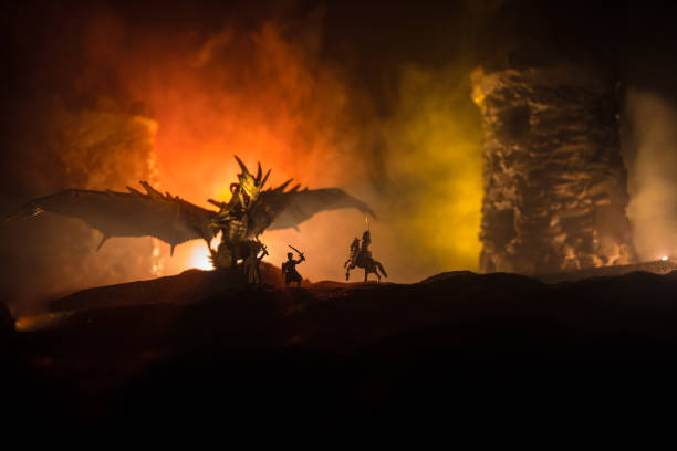 istock Battle between dragon and heroic soldiers. Creative table decoration. Selective focus 1316076677