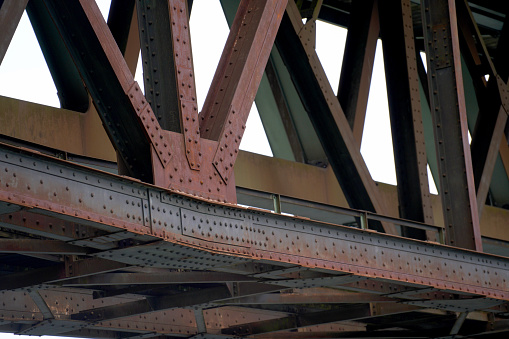 This is a steel construction as a railway bridge in Germany with riveted steel girders