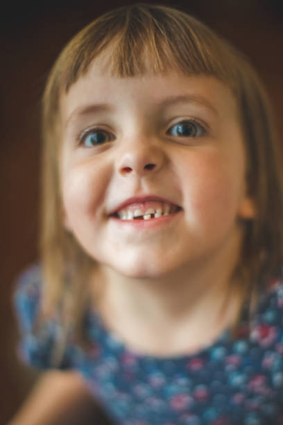 istock First Tooth Loss For A Cute 5 Years Old Girl 1316078210