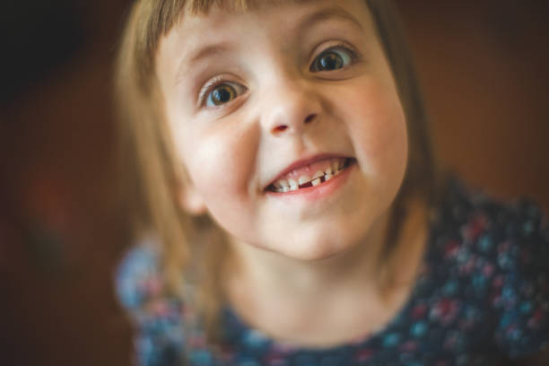 istock First Tooth Loss For A Cute 5 Years Old Girl 1316078229
