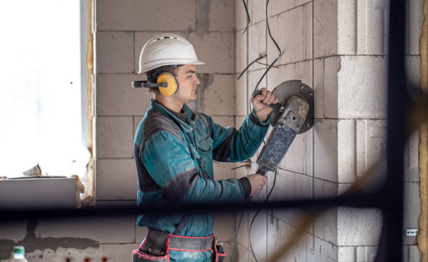 istock A handyman at a construction site works as a grinder. 1316080796