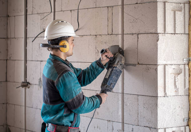 istock A handyman at a construction site works as a grinder. 1316080802