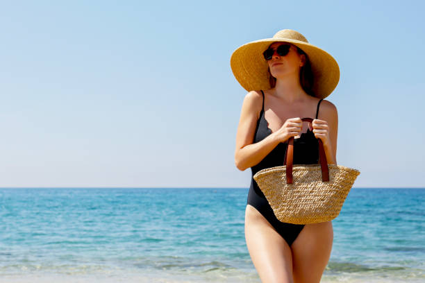 istock Fashion model on the beach 1316081251