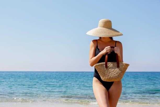 istock Fashion model on the beach 1316081264