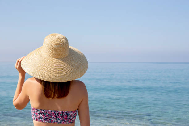istock Fashion model on the beach 1316081371