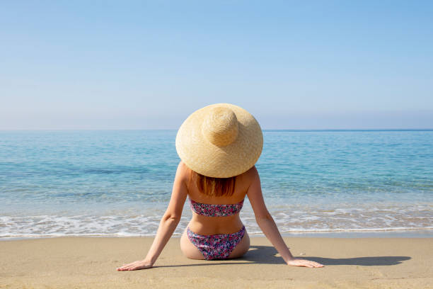 istock Fashion model on the beach 1316081373