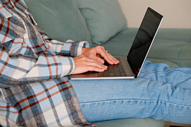 istock Woman on a blue couch 1316081451