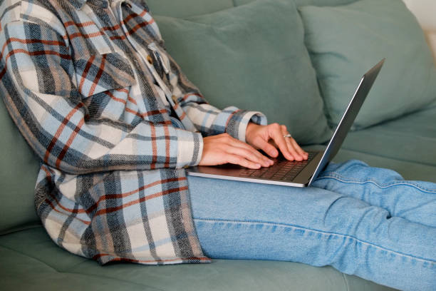istock Woman on a blue couch 1316081454