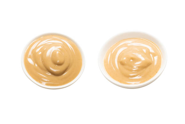 istock Mushroom sauce in a bowl isolated on white background. 1316081535