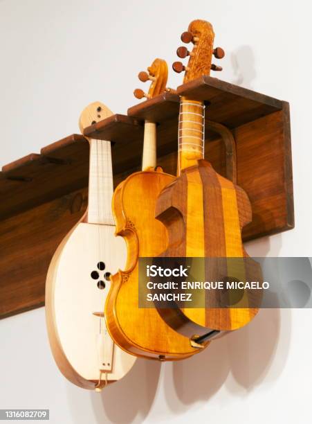 String Instrumentsside By Side Various Handmade String Instruments Hanging On Display Stand Stock ...