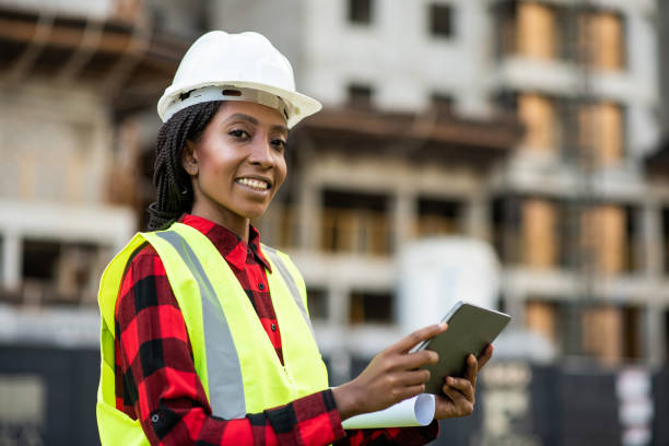 istock Businessman - Woman at construction site using digital tablet 1316086419