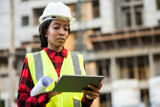 istock Businessman - Woman at construction site using digital tablet 1316086421
