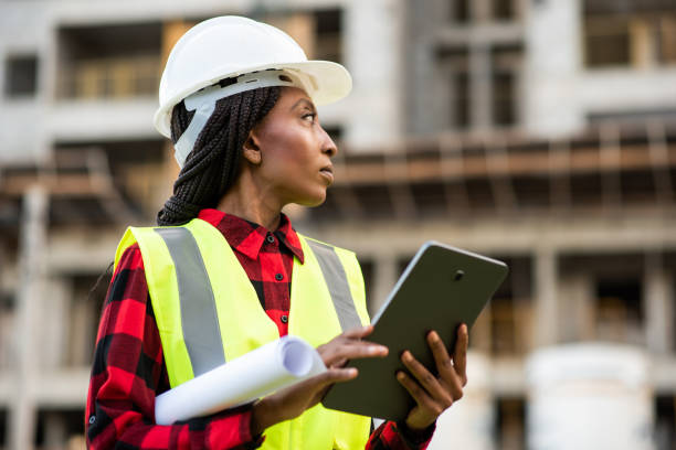 istock Businessman - Woman at construction site using digital tablet 1316086459