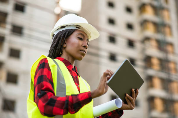 istock Businessman - Woman at construction site using digital tablet 1316086477