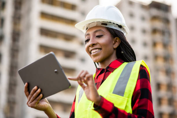 istock Businessman - Woman at construction site using digital tablet 1316086492