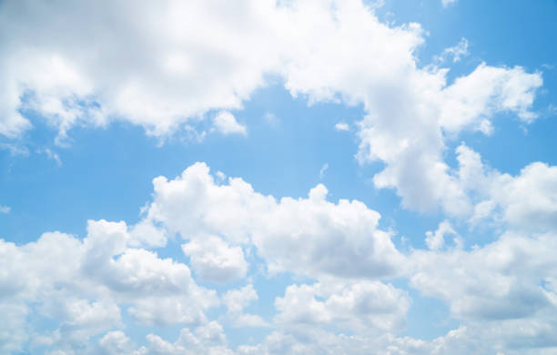 istock Fresh blue sky and soft white clouds, Bright blue sky with fluffy white clouds, The idea for the feeling of fresh weather, Bright blue sky with fluffy white clouds, Clean on a hot sammer day. 1316089146